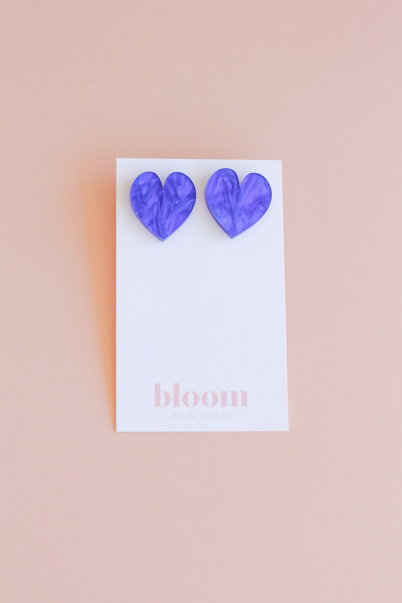 flirty flutter heart studs