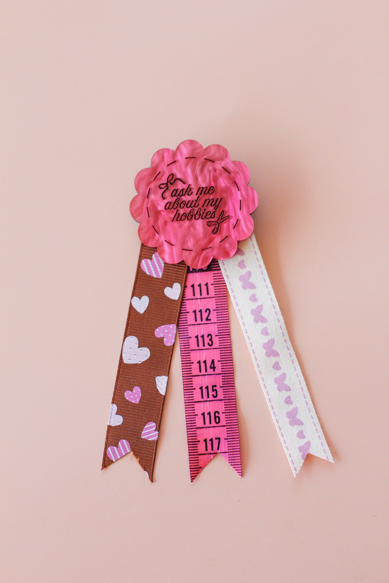 ask me about my hobbies rosette badge