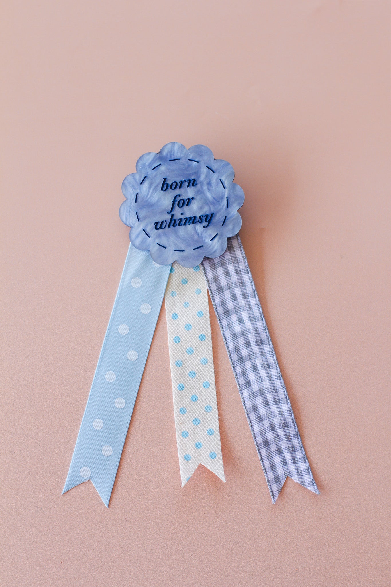 born for whimsy rosette badge
