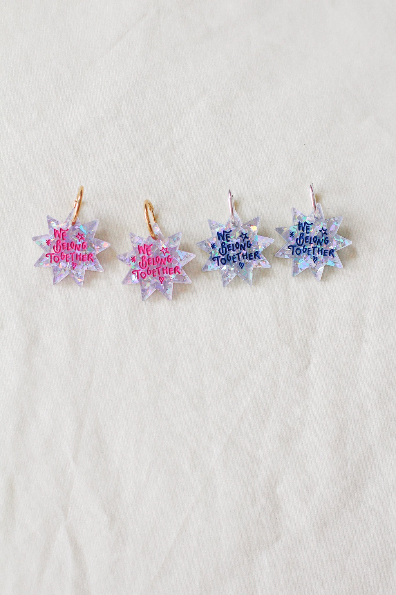 aperture hoop earrings