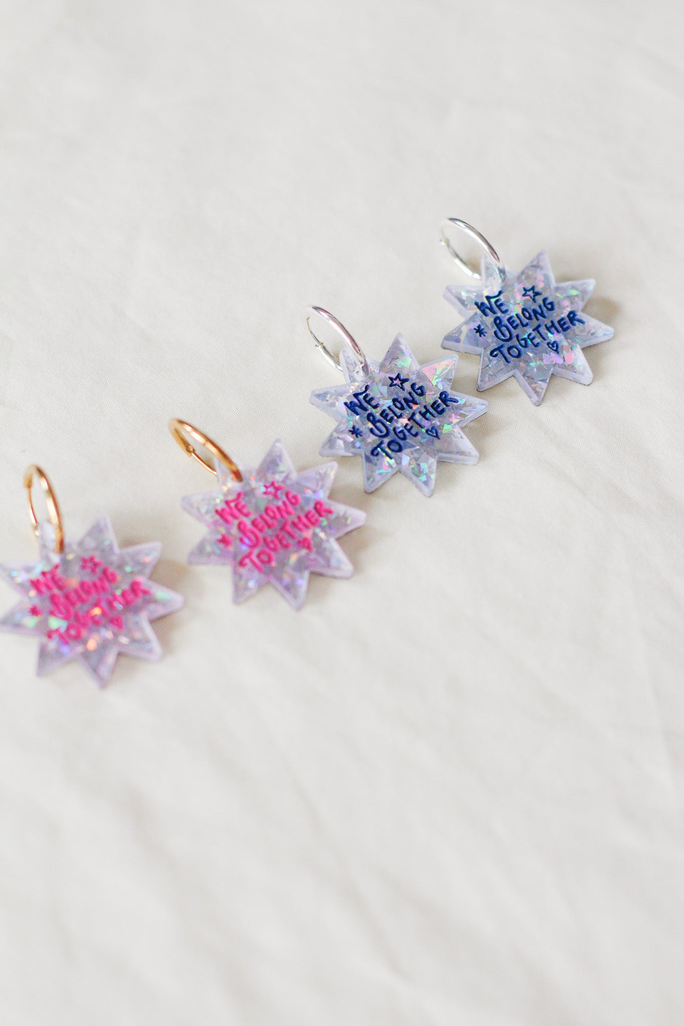 aperture hoop earrings