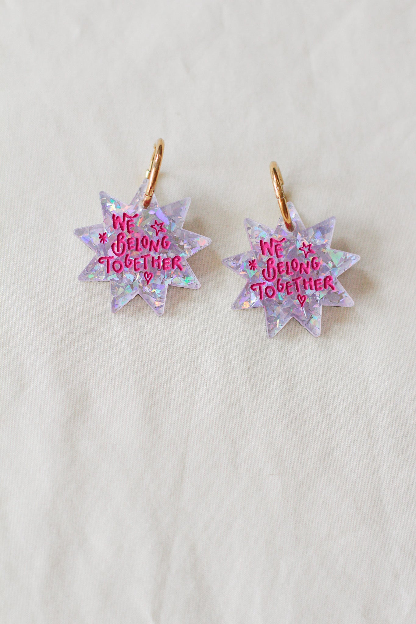 aperture hoop earrings