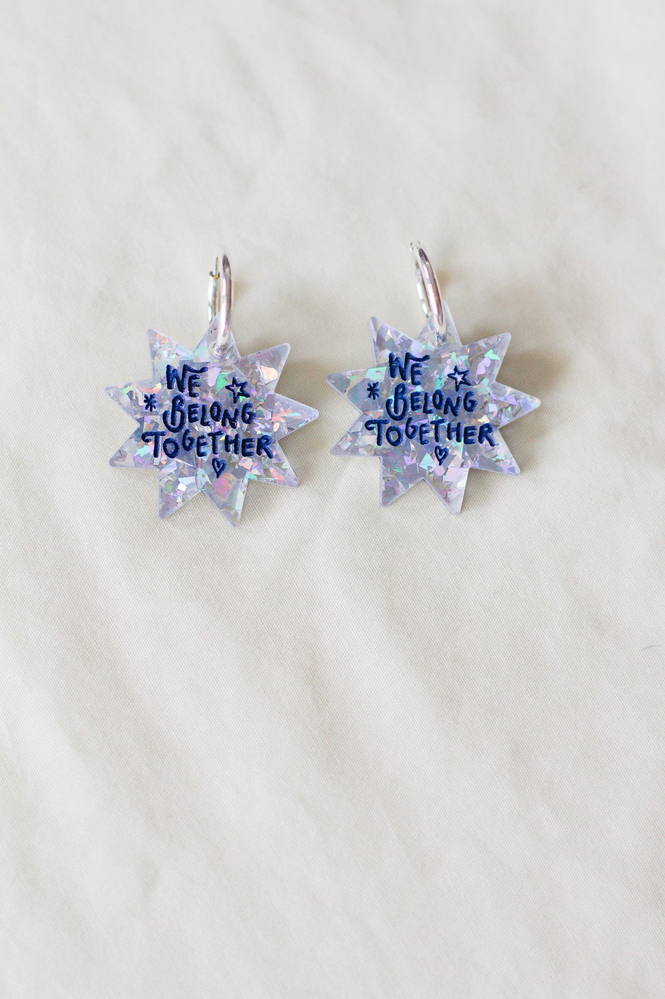 aperture hoop earrings