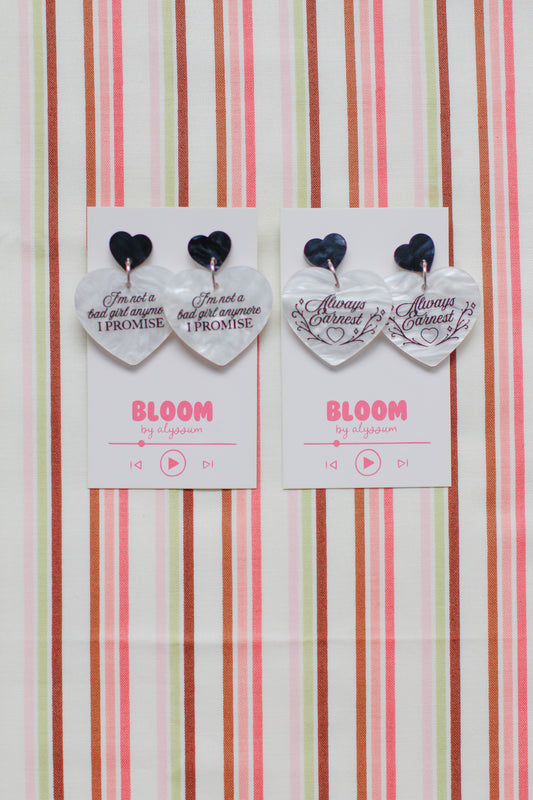 charli - wink wink heart dangle earrings